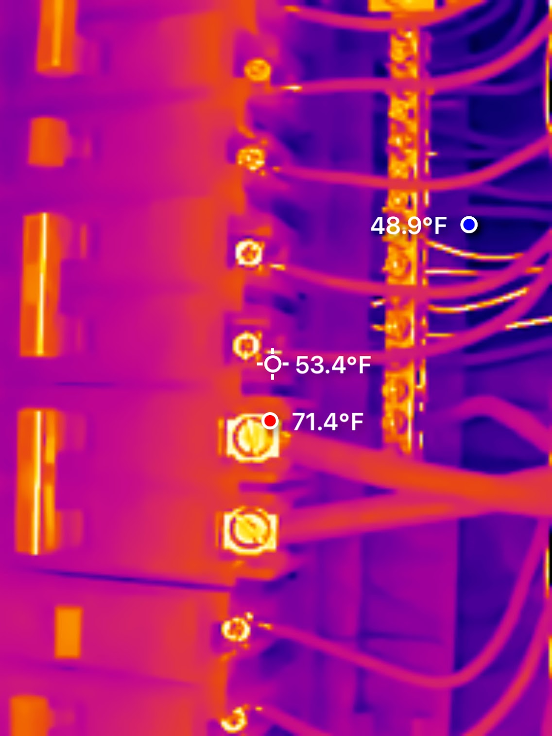 FLIR thermal imaging scan of a residential electrical panel showing an overheating breaker lug