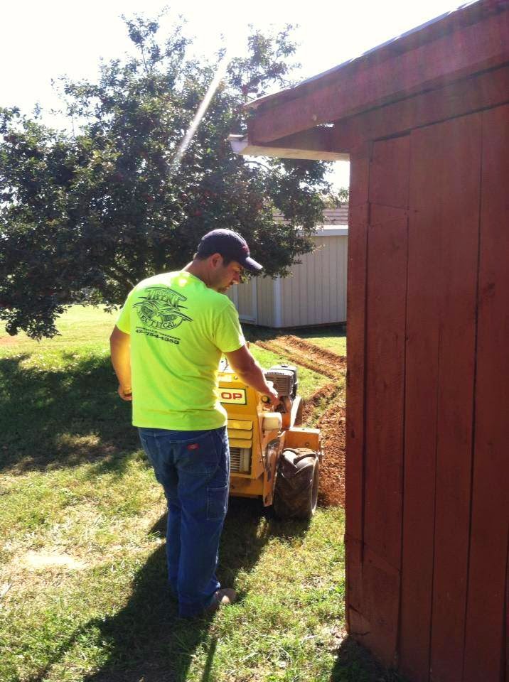 Trenching for an underground 200 amp service feeder in Rogersville TN